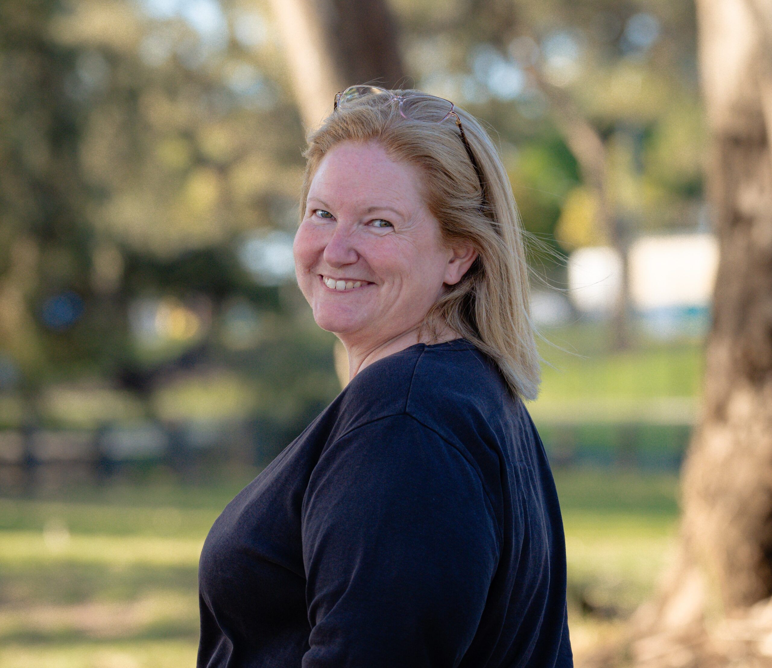 Woman smiling in park
