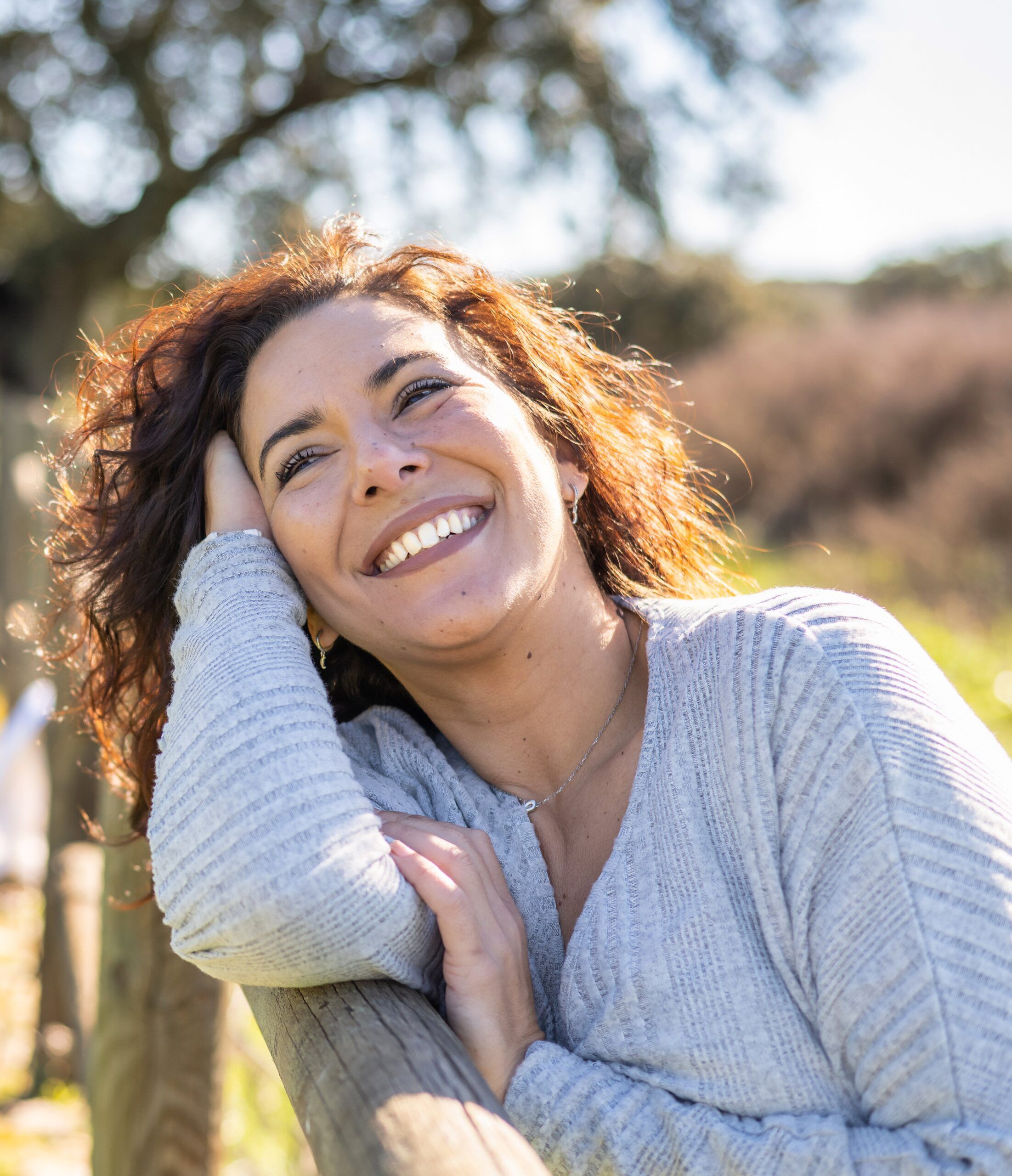 woman smiling outside